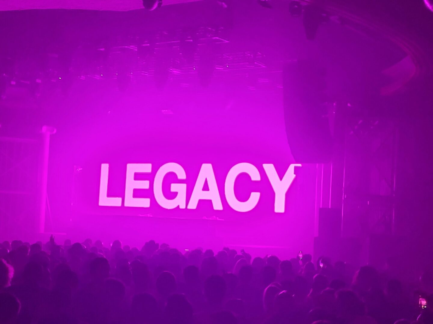 Here's an alt tag for the image: "Legacy concert crowd"