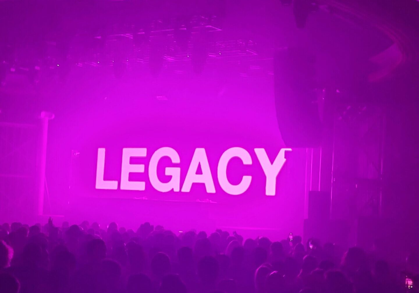 Here's an alt tag for the image: "Legacy concert crowd"