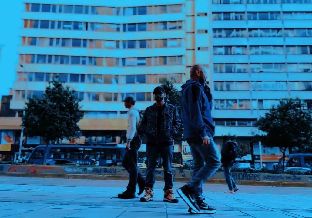 People walking in urban city setting.